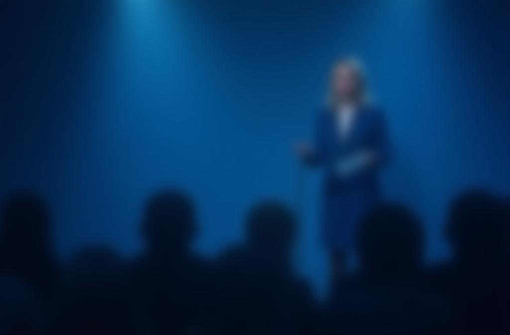 Professional person confidently addressing a media setting
